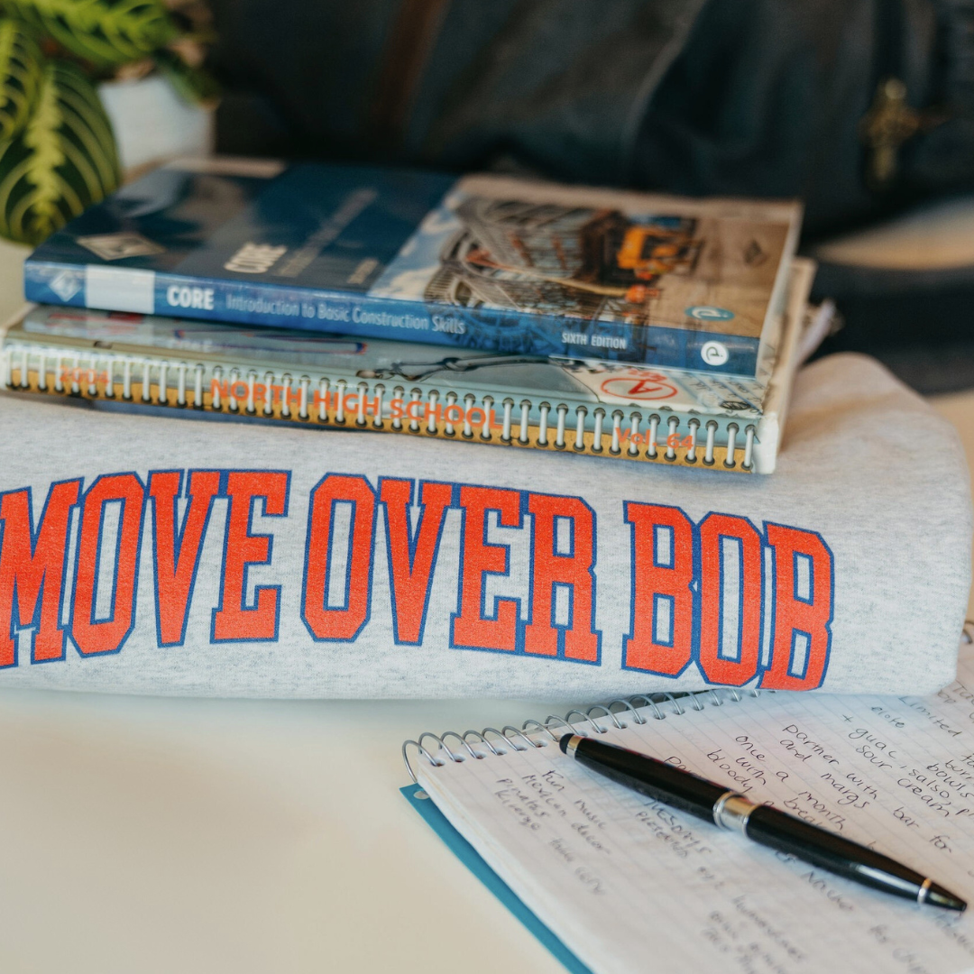 move over bob gray sweatshirt with move over bob red lettering in college style design.